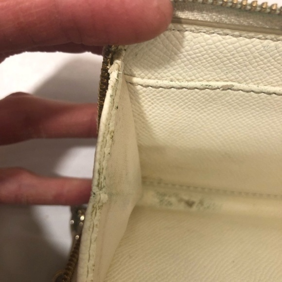 Coach debossed creamy white double zipper wristlet